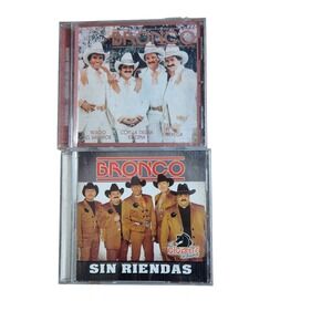 Lot of 2 Bronco CDs Sergio El Bailador, Sin Riendas El Gigante de America Latin